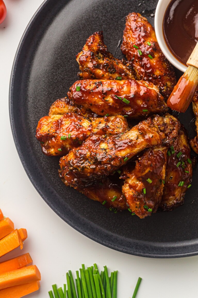 a plate filled with air fryer bbq chicken wings.